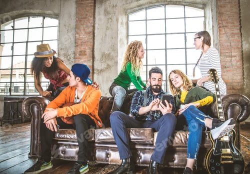Preview: Friends having fun on the sofa at home