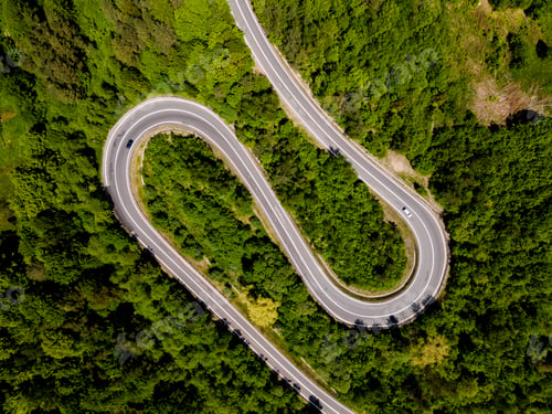 Preview: Curvy Road in Forest. Top Down Drone View