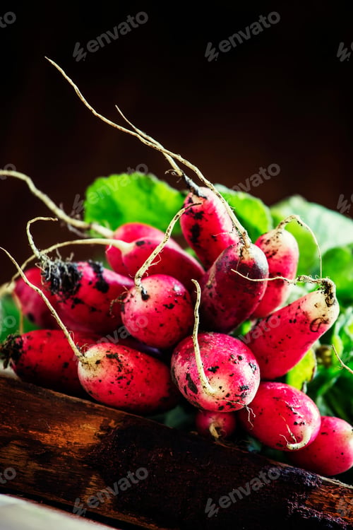 Preview: Dirty radish, vintage wooden background, selective focus