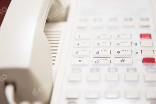 Preview: Close Up of a White Office Telephone