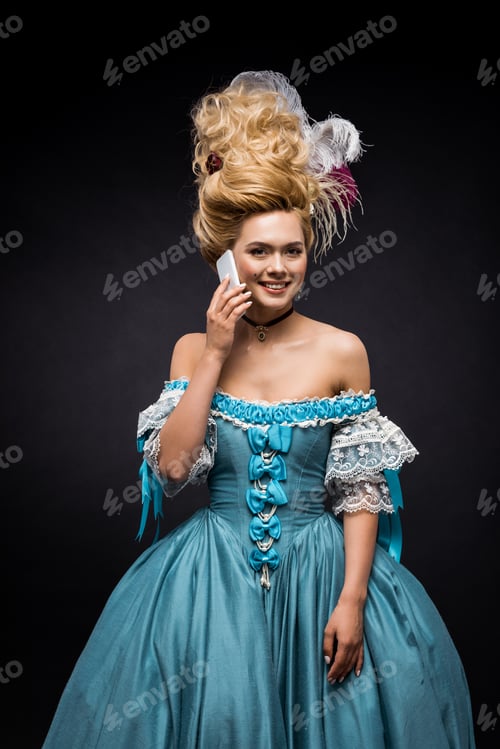 Preview: happy victorian woman talking on smartphone on black