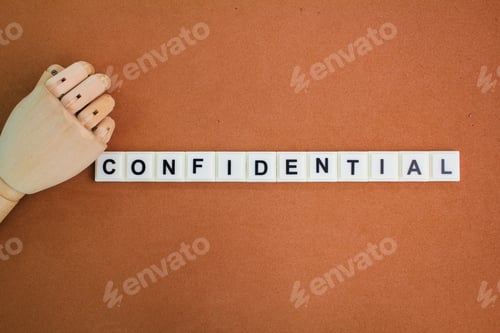 Preview: Judge's hammer and letters of the alphabet with the word confidential.