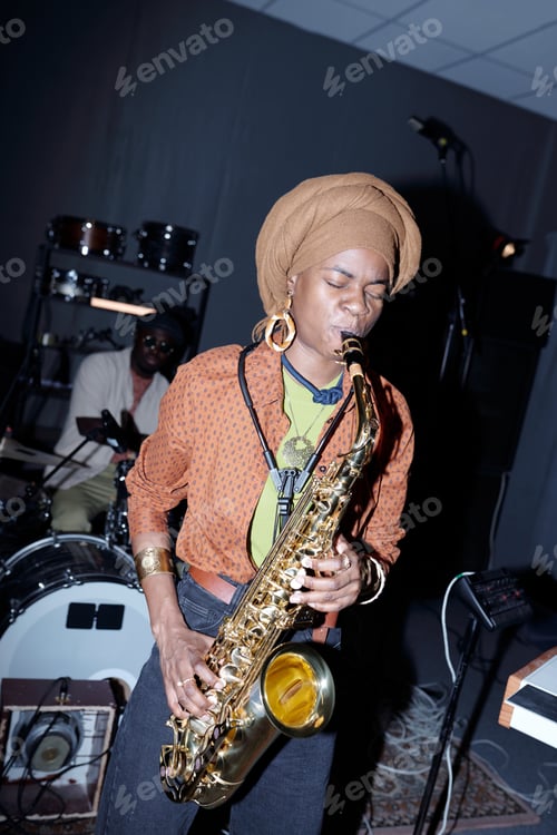 Preview: Performing Musician Playing Saxophone at Indoor Venue