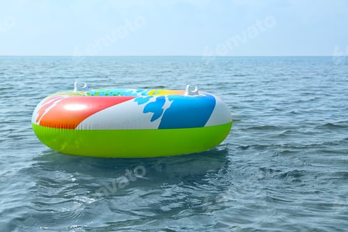 Preview: Bright inflatable ring floating on sea water. Summer vacation