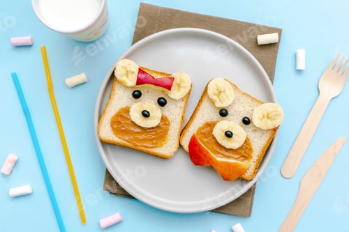 Preview: Funny cute bear,dog face sandwich toast bread with peanut butter,banana. Kids childrens breakfast