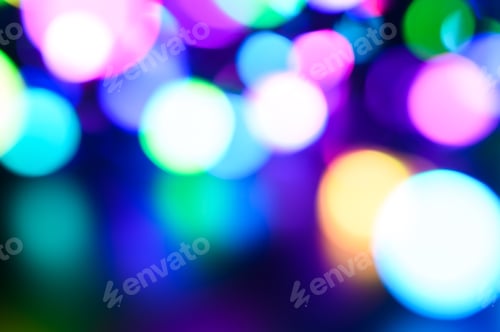 Preview: blurred night multicolored glowing lights on black background. new year and christmas concept