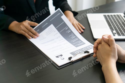 Preview: The job interviewer is checking all the documents of the applicant for the secretary position. Prepa