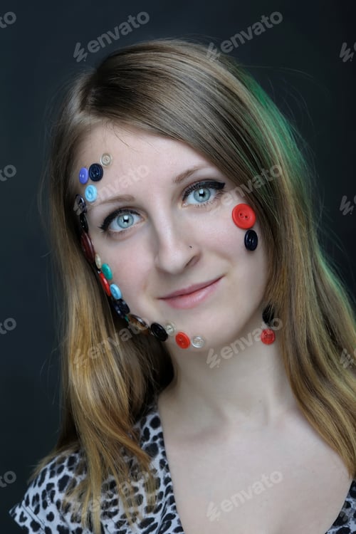 Preview: Creative Portrait Of Girl With Buttons On Her Face