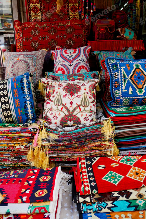 Preview: Colourful cushions on display for sale in a traditional Turkish Bazaar.