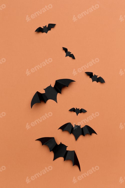 Preview: halloween and decoration concept - paper bats flying