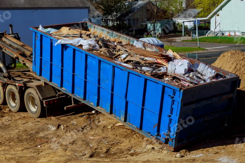Preview: Truck loading a recycling garbage full skip waste management container