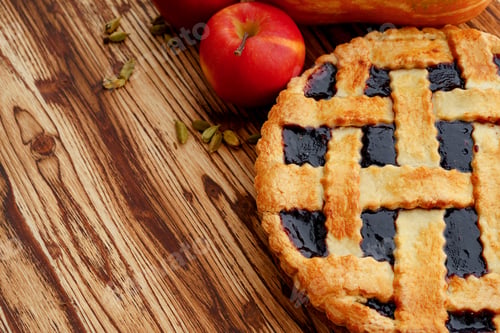 Preview: Close up of a berry tart pie on wooden table