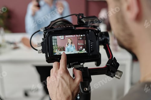 Preview: Filming Woman with Curly Hair in Home Studio
