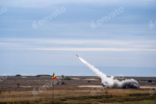 Preview: Rocket soaring in the sky, with a billowing cloud of smoke trailing behind it