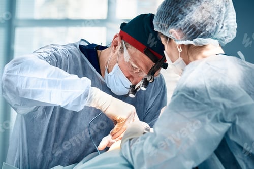Preview: Close-up of surgeons in the operating room during the operation.Modern medicine, Medical workers