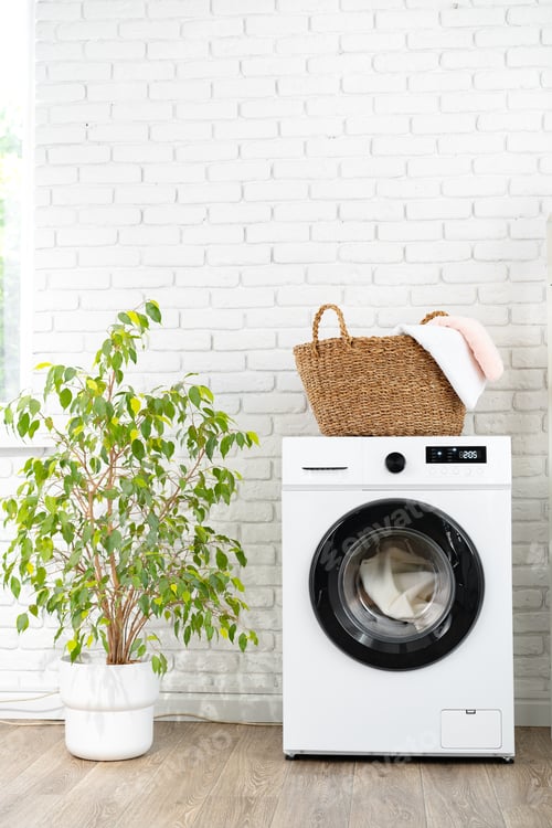 Preview: Laundry basket on washing machine in a laundry room