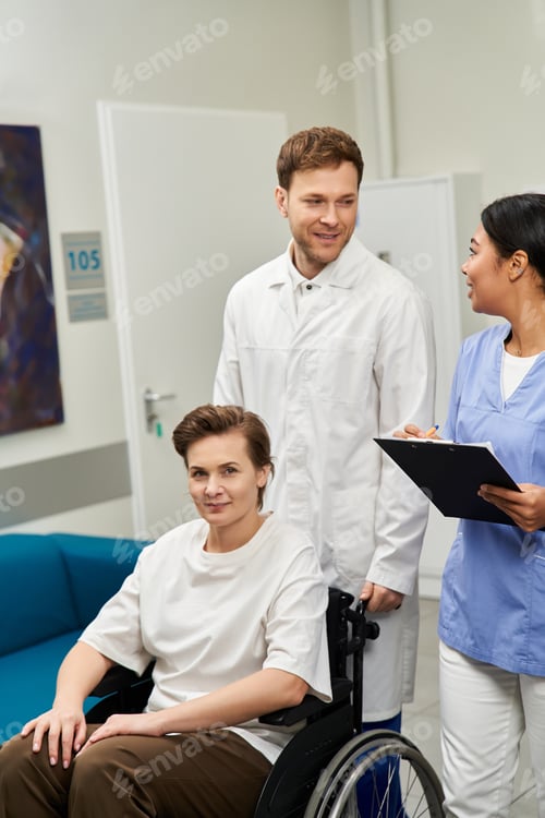 Preview: Healthcare team supports patient before MRI scan in modern hospital setting