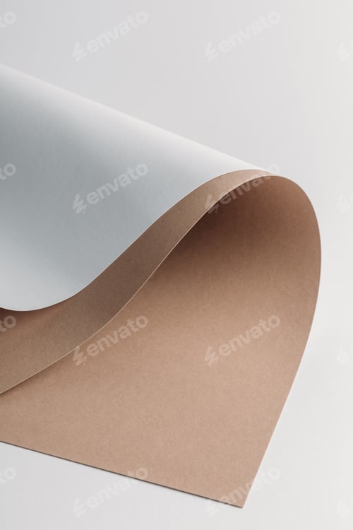 Preview: decorative white and brown paper sheets on grey background