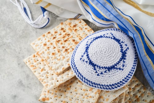 Preview: Passover celebration concept. Matzah, red kosher and walnut. Traditional ritual Jewish bread matzah,