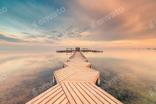Preview: Wooden pier on cloudy evening