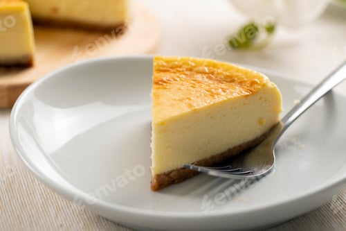 Preview: Piece of homemade plain cheesecake
