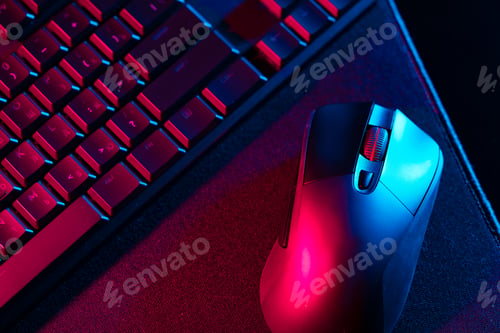 Preview: Computer keyboard and mouse on black background