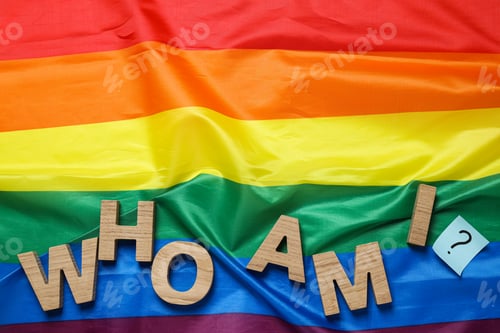 Preview: Text from wooden letters on LGBT flag background, space for text