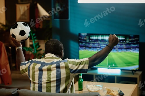 Preview: Black Guy Watching Soccer Game On TV