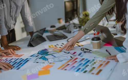 Preview: Startup team collaborates on color selection for user centric product design, optimizing experience