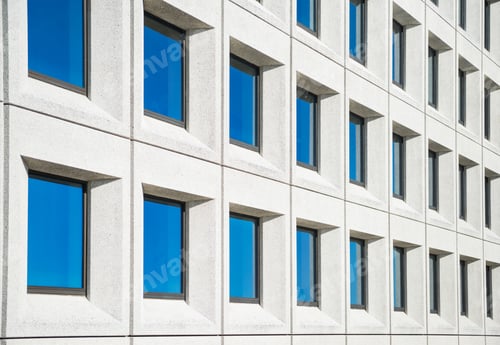 Preview: full frame view of modern white house with blue windows in copenhagen, denmark