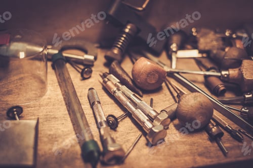 Preview: Different goldsmiths tools on the goldsmith workplace.