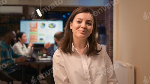 Preview: Smiling employee working on digital tablet portrait, zoom in