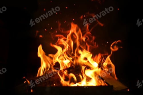 Preview: Fireplace with burning wood, closeup view. Winter vacation