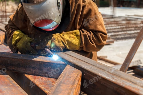 Preview: Welding work, welder welding metal material in heavy industry manufacturing
