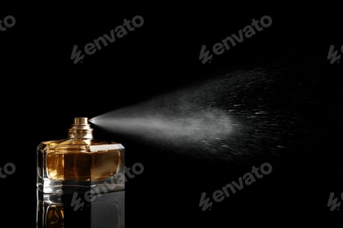 Preview: Spraying bottle of perfume on black background