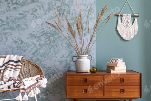Preview: Stylish composition of creative and cozy living room interior with wooden vintage commode.