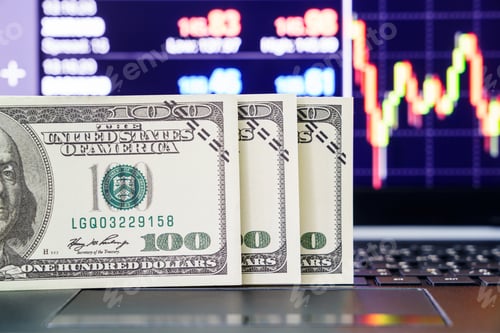 Preview: Banknotes on keyboard with chart_
