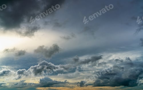 Preview: Sunset sky and gray and golden clouds. Gray sky and fluffy clouds. Thunder and storm sky. Sad