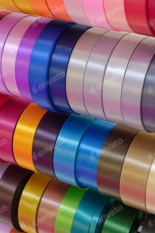 Preview: Rolls of multi-coloured decorative ribbons