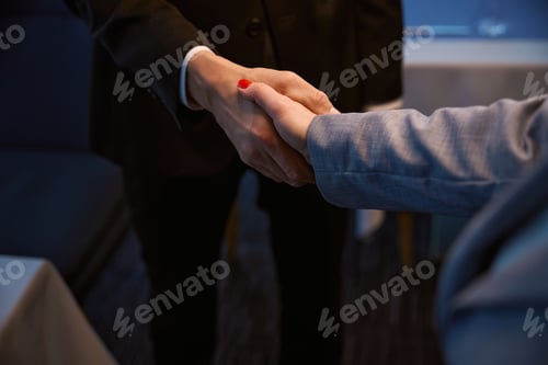 Preview: Female with a neat manicure and a male shake hands
