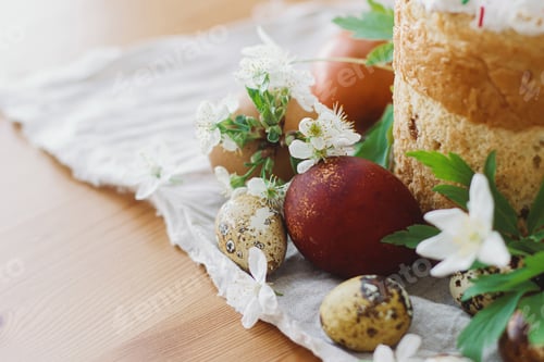 Preview: Happy Easter! Stylish easter eggs, blooming spring flowers and homemade Easter bread on rustic table