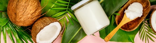 Preview: Coconut oil, tropical leaves and fresh coconuts