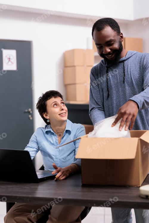 Preview: Supervisor woman sitting at desk searching for customer transportation details on laptop computer