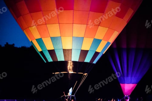 Preview: hot air balloons flying at night