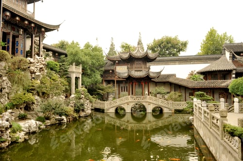 Preview: Traditional Chinese garden with fish pool, stone bridge and pavilions, Hangzhou, China