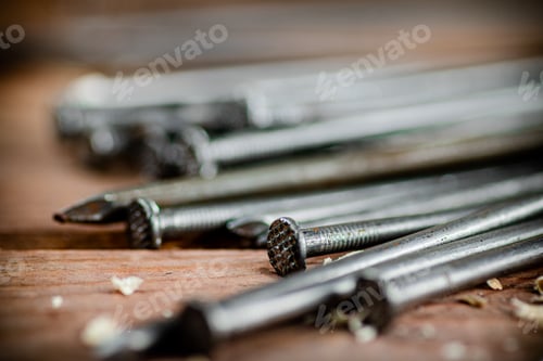 Preview: A bunch of nails on the table.