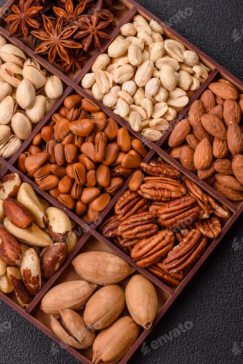 Preview: Box with various nuts cashew, macadamia, peanut, cedar, pecan, walnut, brazil, hazelnut