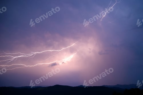 Preview: Lightning strike on the dark cloudy sky