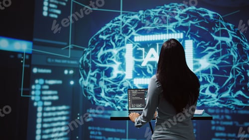 Preview: Woman working on laptop in cutting edge workspace featuring AI systems