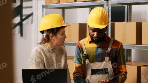 Preview: Coworkers reviewing stock products
